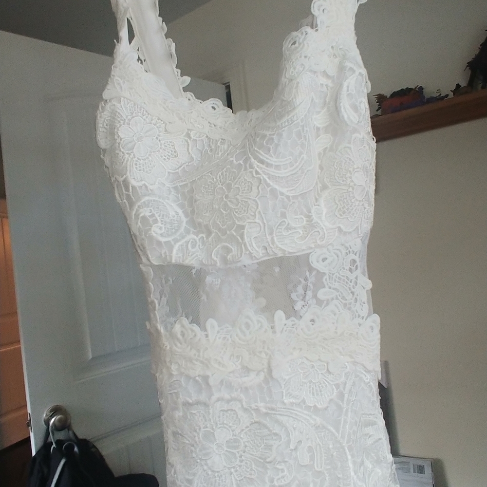 White lace cocktail dress.